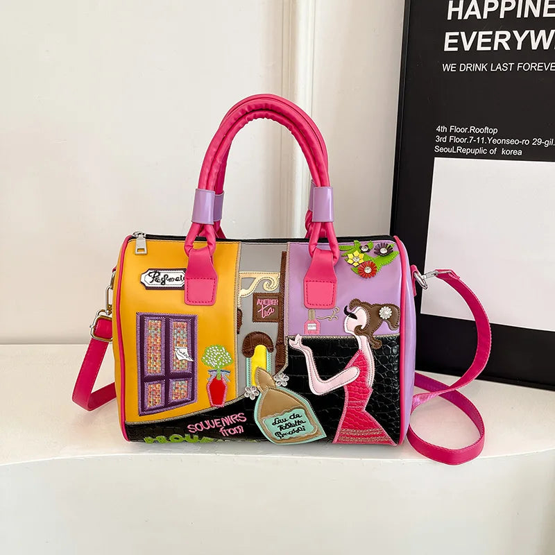 Colorful handbag with artistic design on a white surface