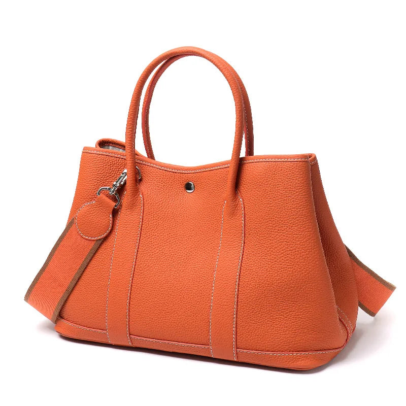 Orange handbag on a white background
