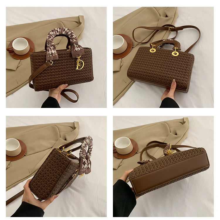 Brown woven handbag held by a person on a neutral background