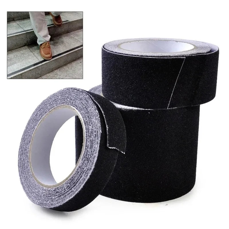 Three rolls of black adhesive tape on a white background, with a small inset photo in the top-left showing a person's feet stepping over a step, demonstrating the tape's use.
