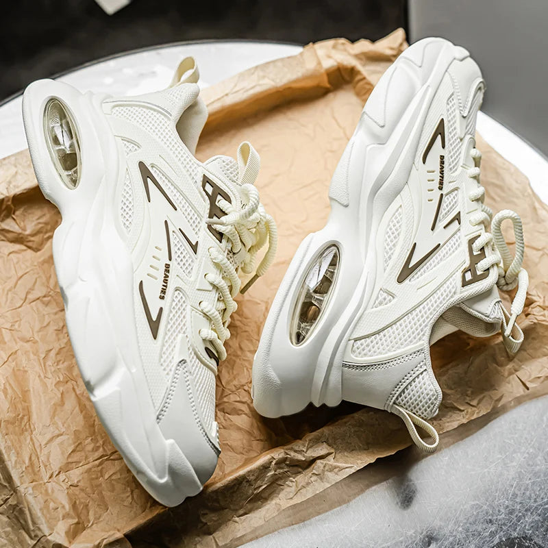 White sneakers with brand logo on a brown paper background