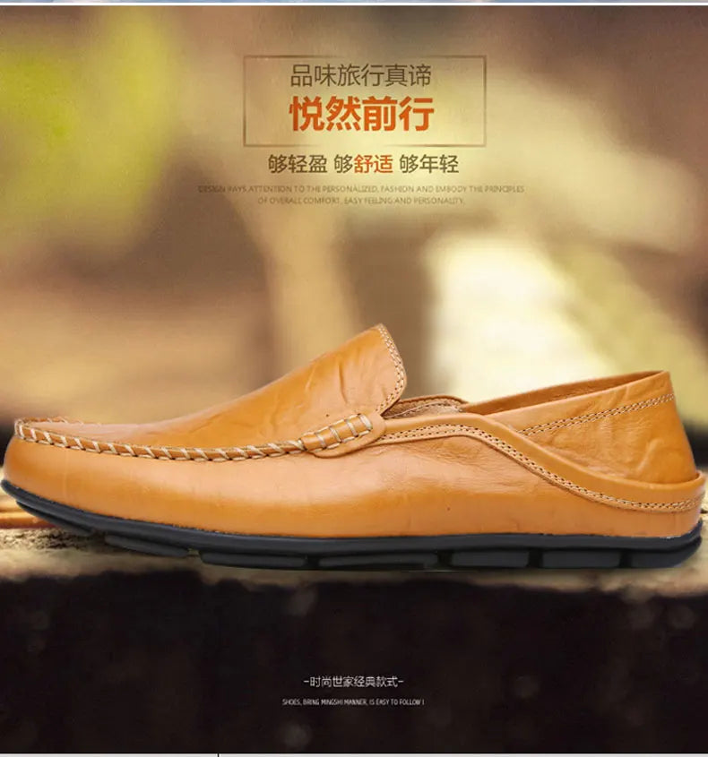 Yellow loafers on a dark surface with a blurred background