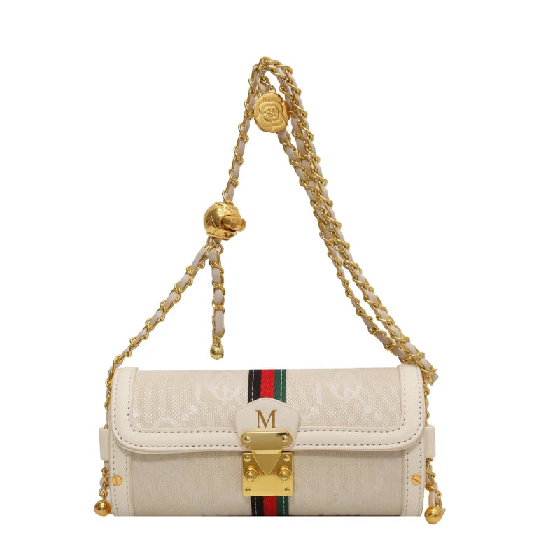 White handbag with gold chain strap and colorful stripe on a white background