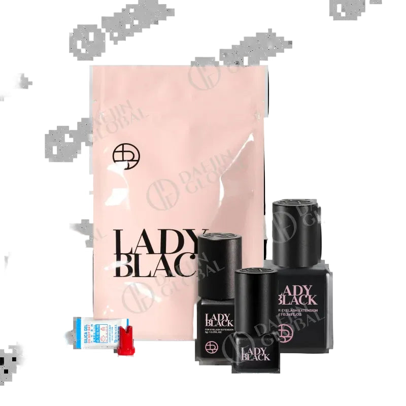 Set of Lady Black nail polish bottles with packaging on a white background