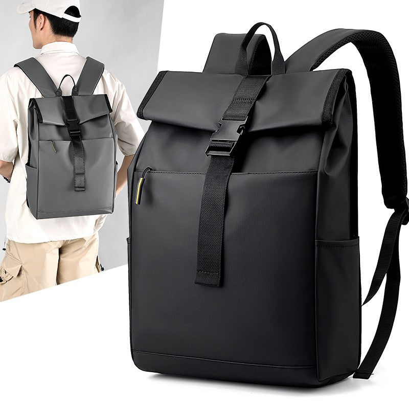 Black backpack with a person wearing a gray backpack in the background