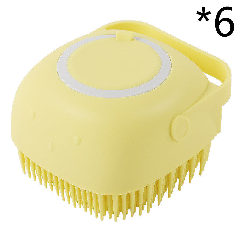 Yellow scrubber with bristles on a white background