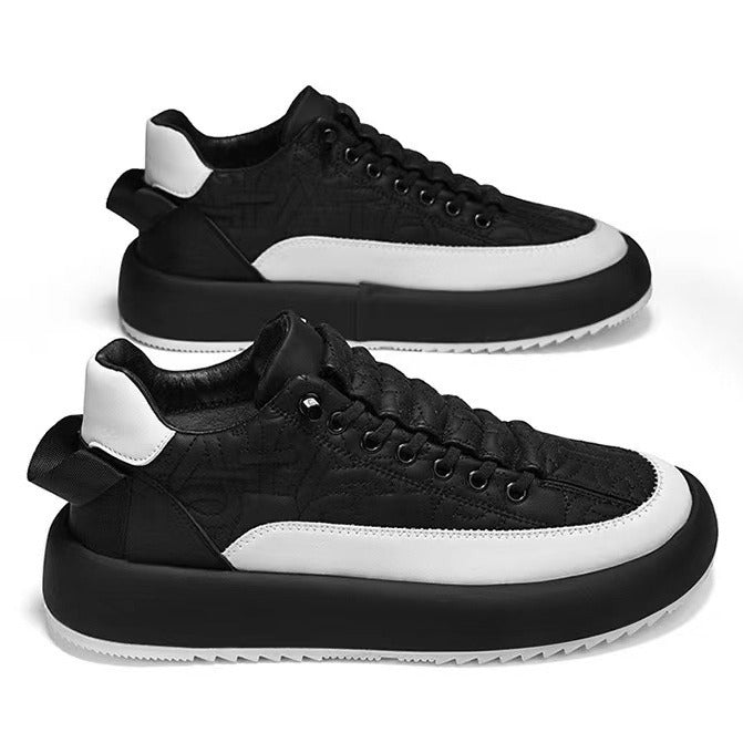 Black and white sneakers on a white background