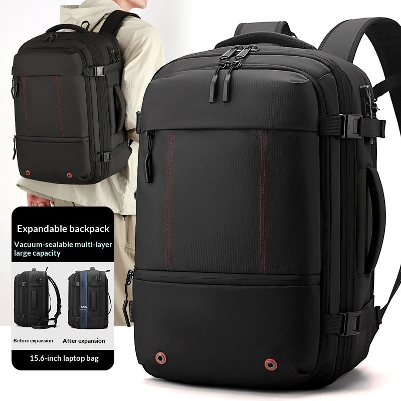 A black expandable laptop backpack shown prominently in the foreground with a model wearing a larger version in the background. The backpack has multiple zip compartments, padded shoulder straps, and subtle red contrast stitching.