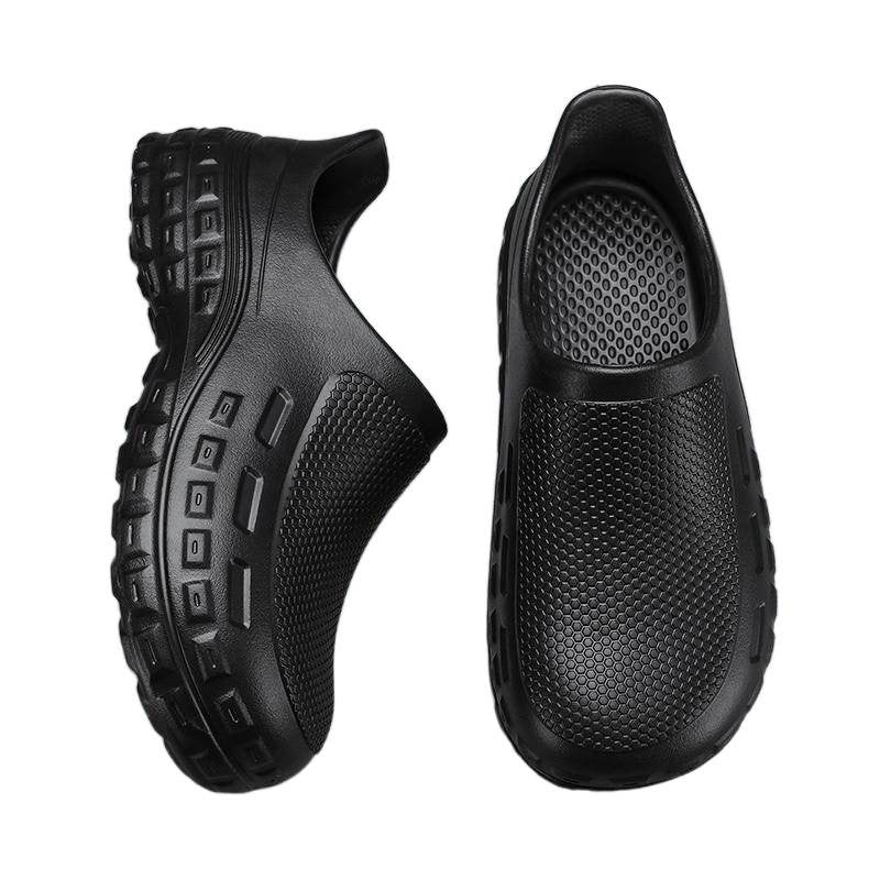 A pair of black slip-on clog-style shoes with textured, vented uppers and rugged soles, shown from side and top views on a plain white background.