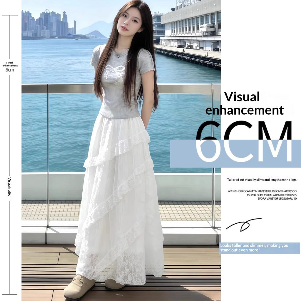 Woman in a white dress standing by a waterfront with text about visual enhancement.