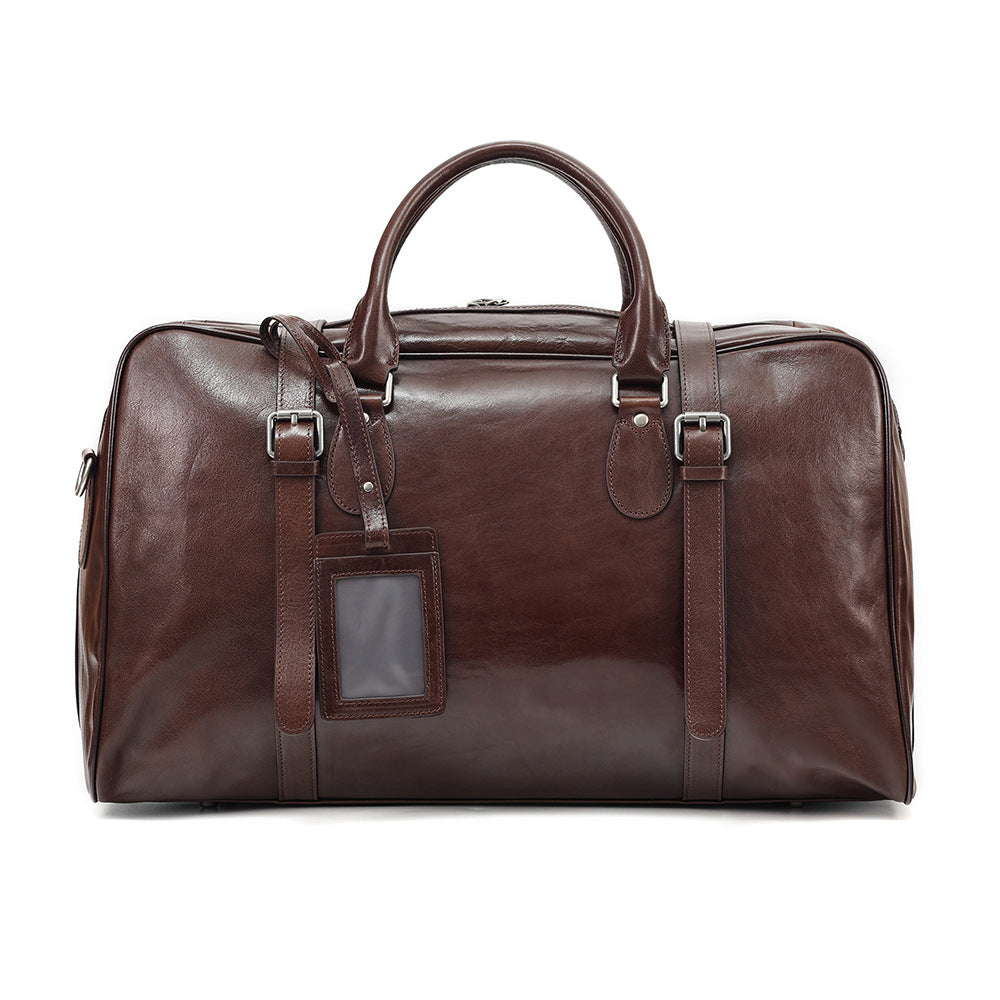 Brown leather duffel bag on a white background
