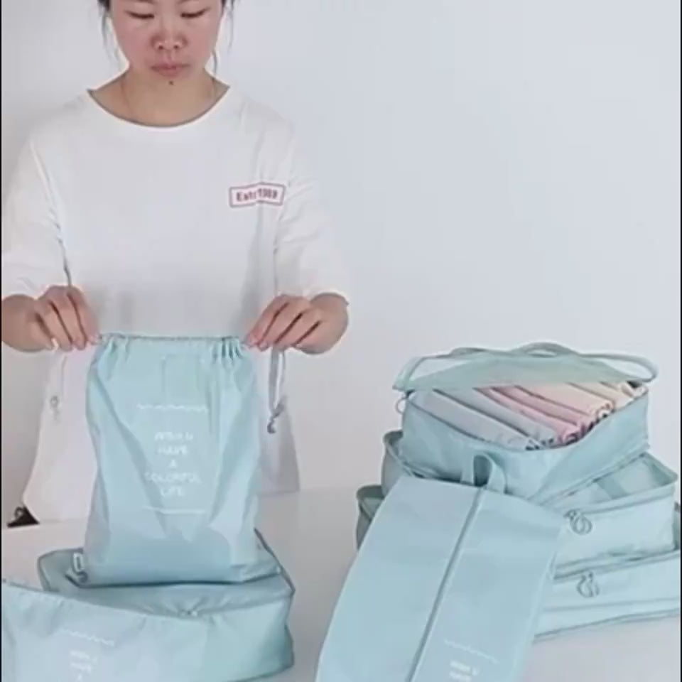 video of woman packing her clothes and shoes organizing specific items into travel organizer luggage bag